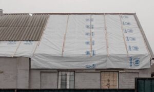 у Нікополі відновлюють пошкоджене житло (фото)